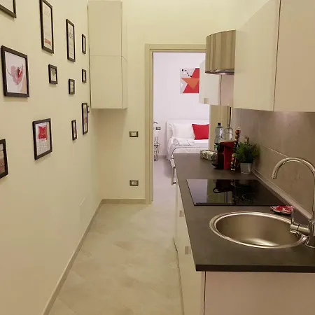 Red And Vanilla Apartment Como