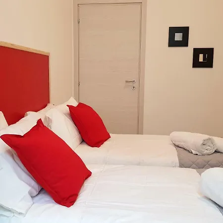 Red And Vanilla Apartment Como