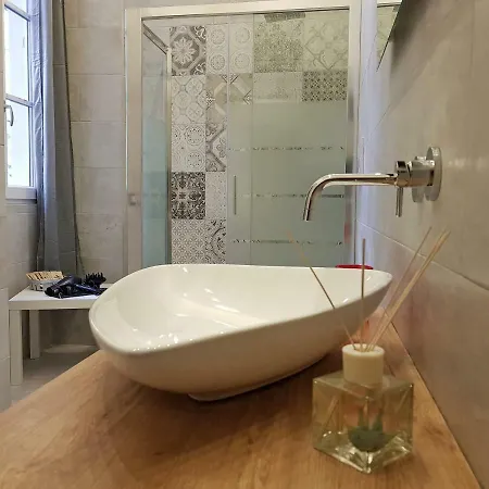 Red And Vanilla Apartment Como