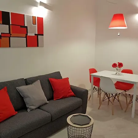 Red And Vanilla Apartment Como