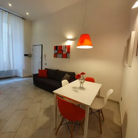 Red And Vanilla Apartment Como