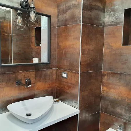 Red And Vanilla Apartment Como